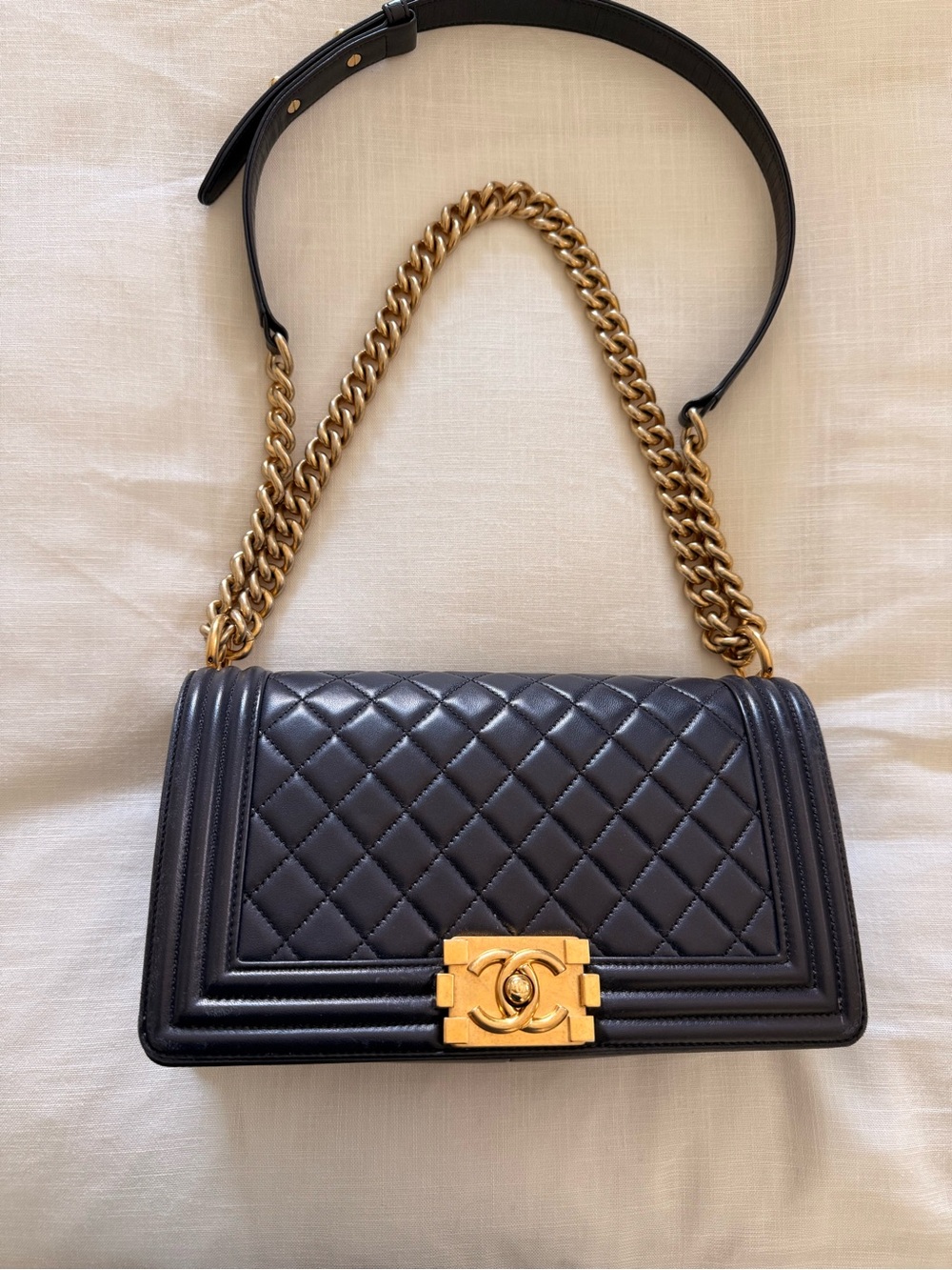CHANEL Black Quilted Shoulder Bag with Gold Hardware